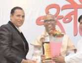 Dr Prashant Sawarkar from Rasulabad Honored with teli Samaj Bhushan Award