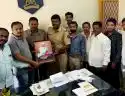  Sakri tilvan teli samaj give Sant Santaji Jagnade Maharaj Photo to government offices